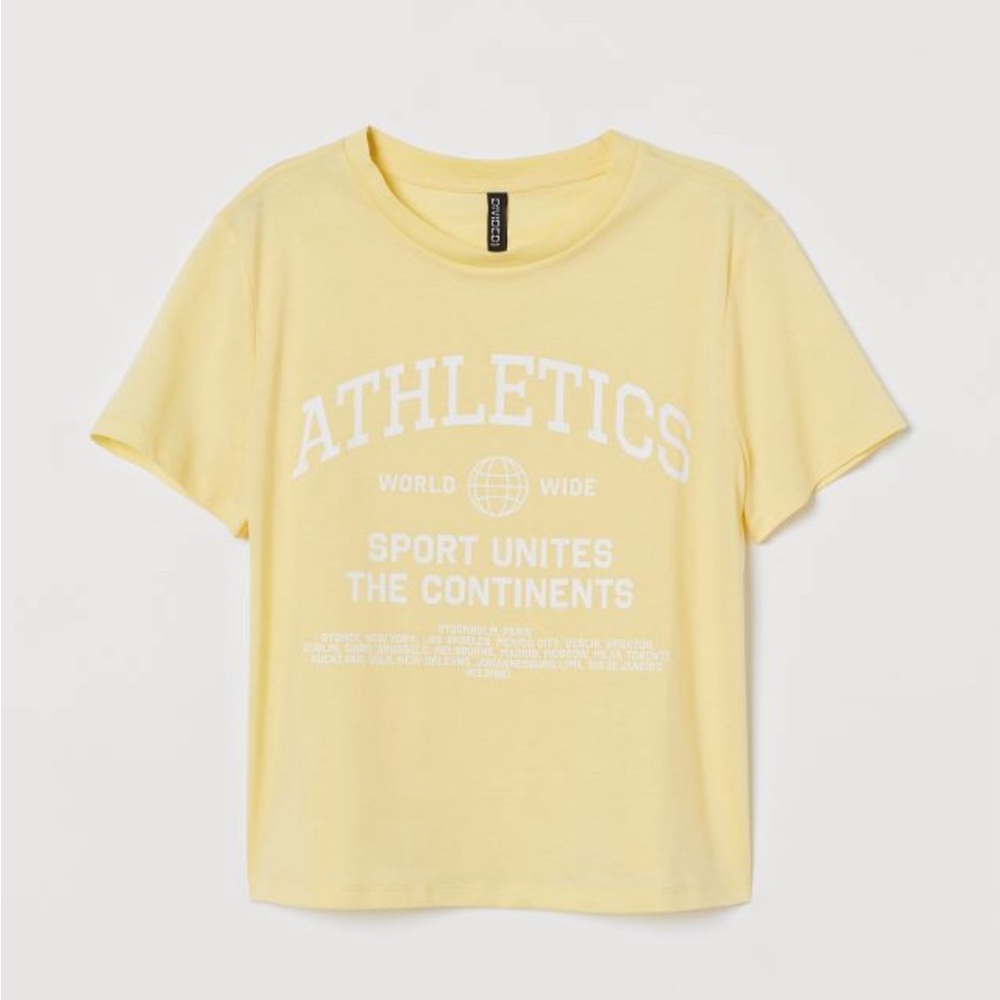 H&M yellow baby tee. Size medium. Super cute with jeans. Perfect length.